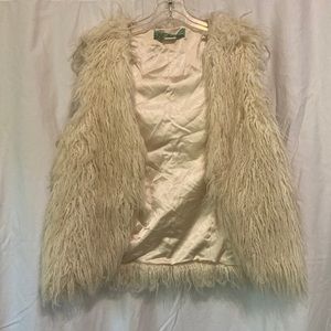White fur vest